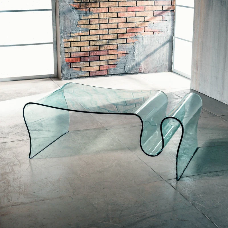 Tavolino in vetro curvato Ralf con portariviste 110 x 60 cm