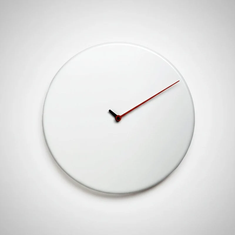 Orologio da muro Less design rotondo in legno